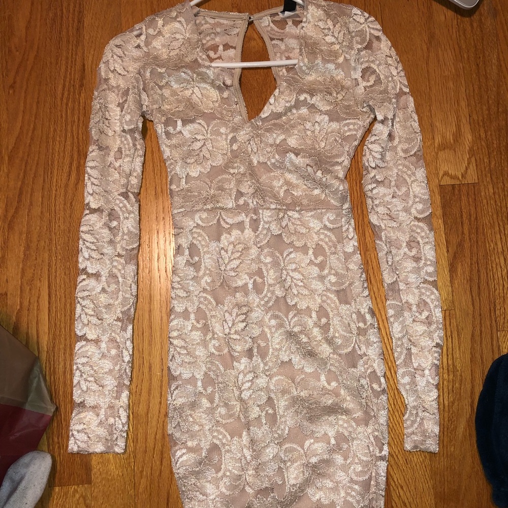 Gold and cream colored bodycon dress